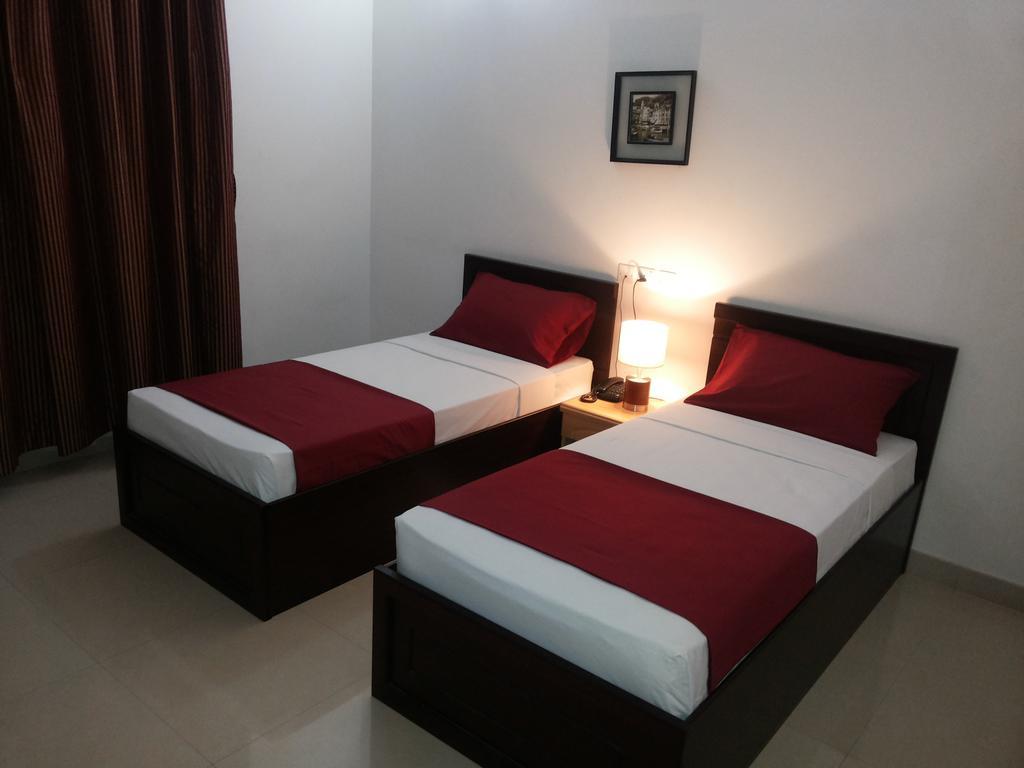 Azaiba Hotel Apartments Mascate Habitación foto